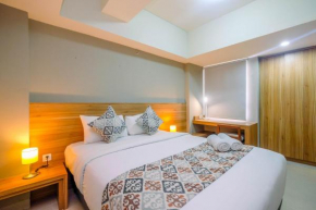 Comfortable 1BR Apartment at Mustika Golf Residence By Travelio